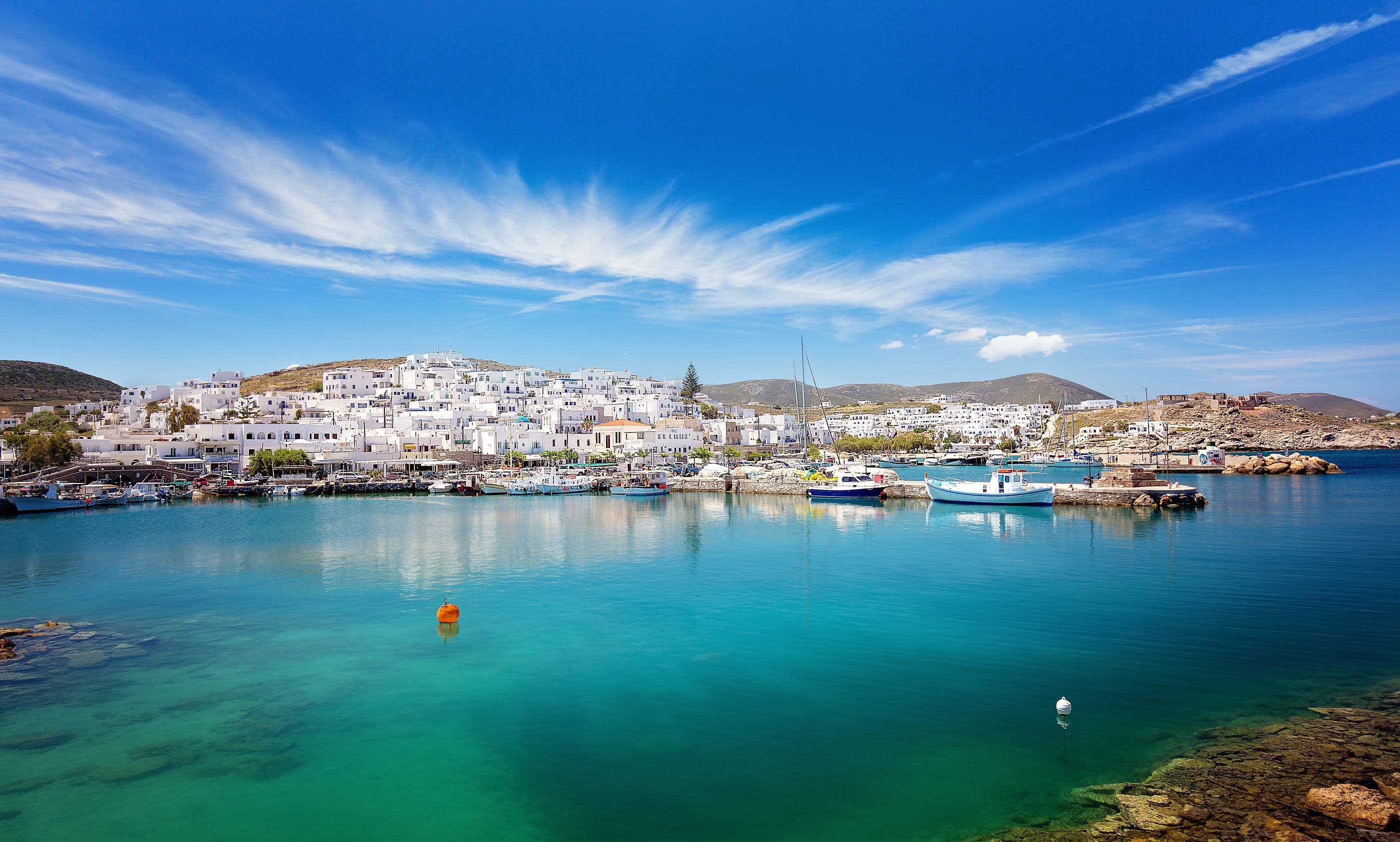 Discovering the iconic port of Naoussa is definitely one of the top things to do in Paros